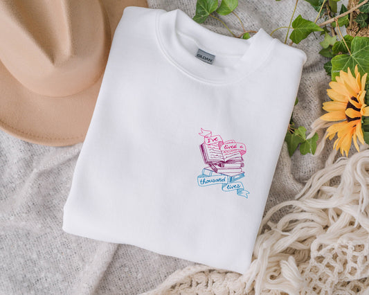 Embroidered Lived 1000 Lives Unisex Crewneck Sweatshirt